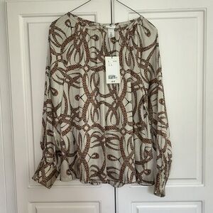H & M Blouse . New with tags. Size 8